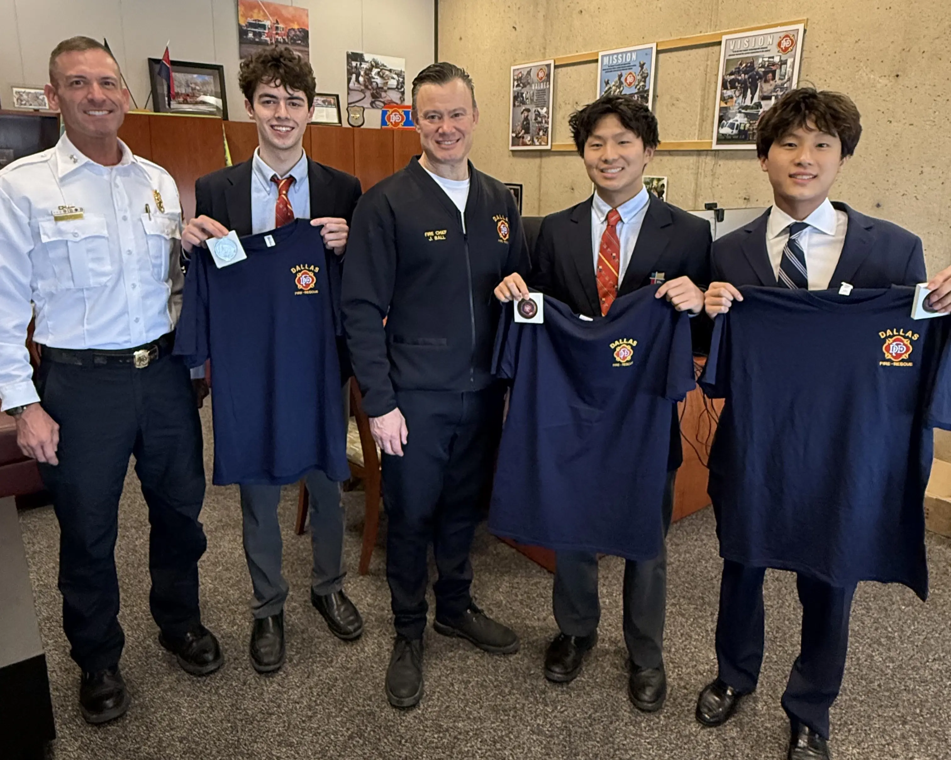 Fireline Fund Dallas Team Receives Dallas Fire-Rescue Shirts